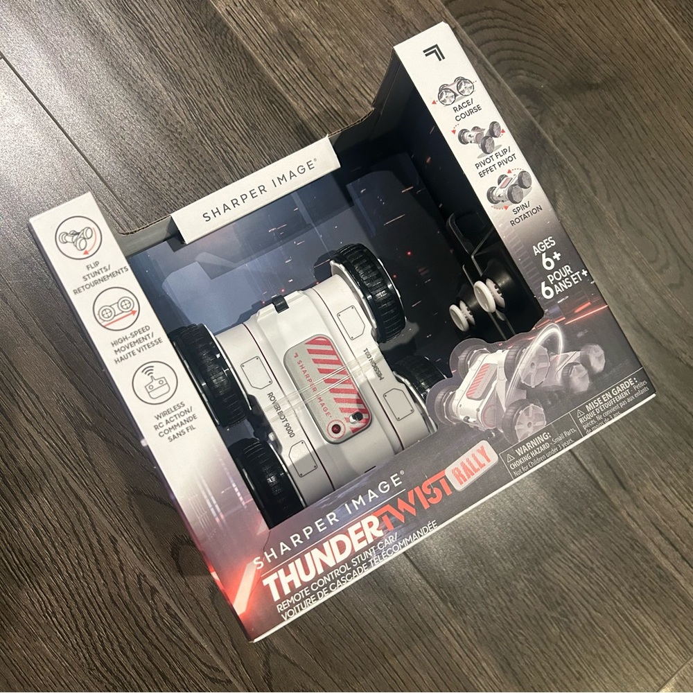 Sharper Image White and Black Remote Control Stunt Car
